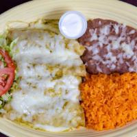 Enchiladas (4) Suiza Dinner - Cheese · Option - Red of Green Sauce
Enchiladas are sautéed with your option of sauce stuffed with ch...