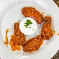 Buffalo Wings (10 Pieces) · Unbreaded chicken wings (flats or drumettes) then coated with your choice of Chef Chatters' ...