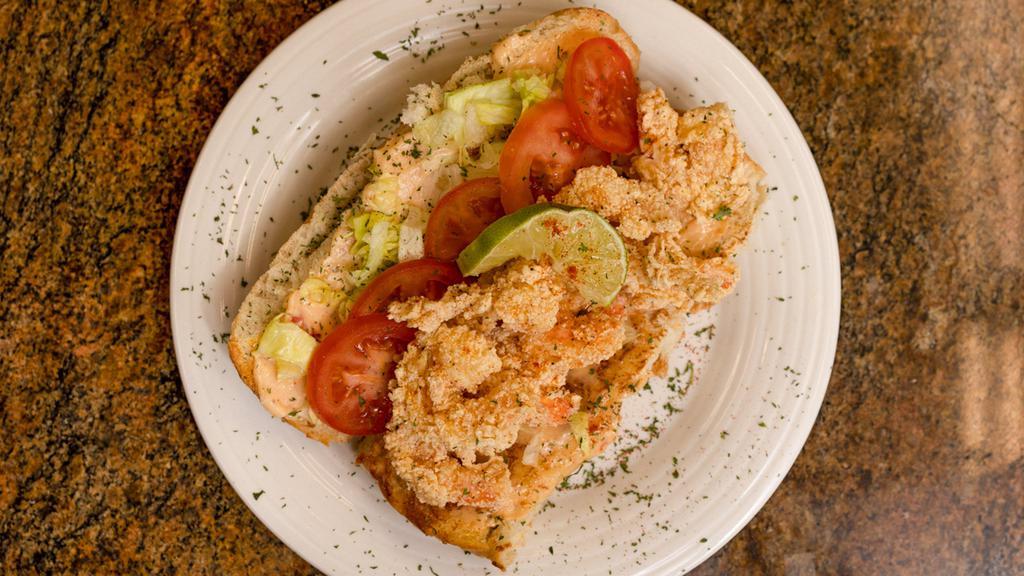 Shrimp Po'Boy · A famous New Orleans-style sandwich stuffed with golden -crispy-fried-shrimp on French bread; and served with Chef Chatters' special aioli sauce.