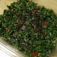 Tabbouli · Fresh finely chopped parsley mixed with burgol (cracjed wheat), diced tomatoes, onlion, fres...