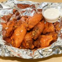 Jumbo Wings · 10 pieces. Marinated and seasoned overnight with your choice of sauce.