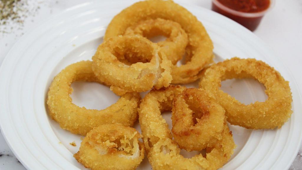 Onion Rings · Steakhouse thick-cut onion rings.