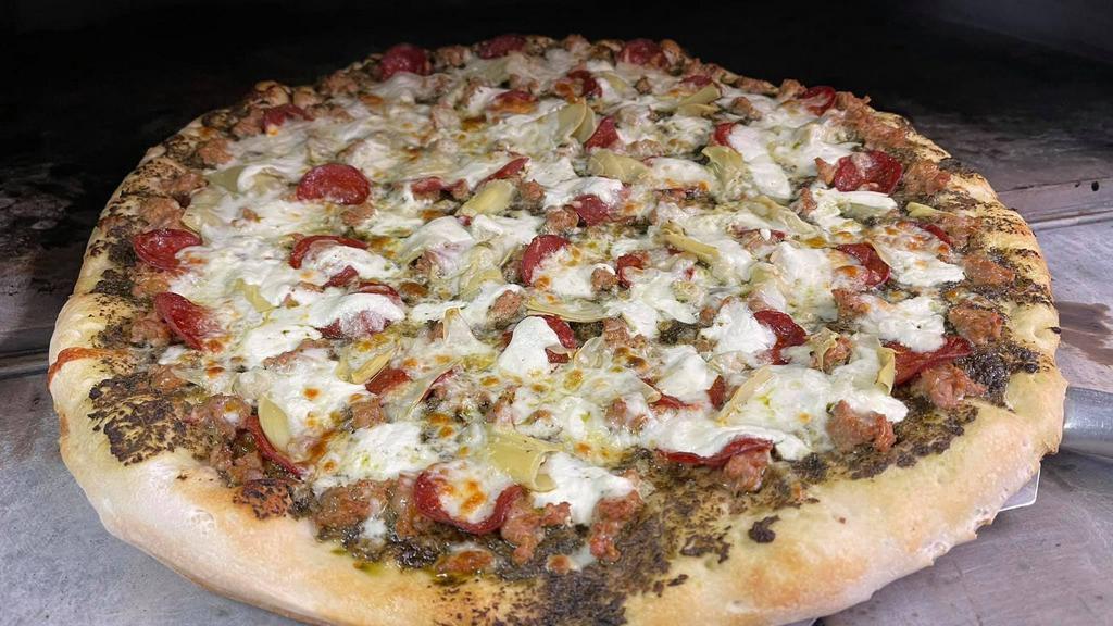 3 Huge Brown Stone Pizza Slices · Our made from scratch pizza starts with our secret multi flour blended dough made fresh daily. Beginning with our special pesto sauce and topped with a mix of ricotta and mozzarella cheese plus Italian sausage, pepperoni and artichoke hearts. A taste of the good life!
