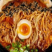 Red Dragon Ramen · Hands down, our spiciest ramen! Chicken bone broth thickened with egg and topped with sliced...