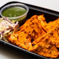 Paneer Tikka  Kababs (8 Pcs) · Indian soft cheese cut in triangle shape, marinated with yogurt and spices, baked. Served wi...