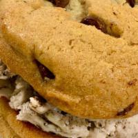 Ice Cream Cookie Sandwich · Vanilla bean ice cream sandwich in between 2 freshly baked chocolate chip cookies