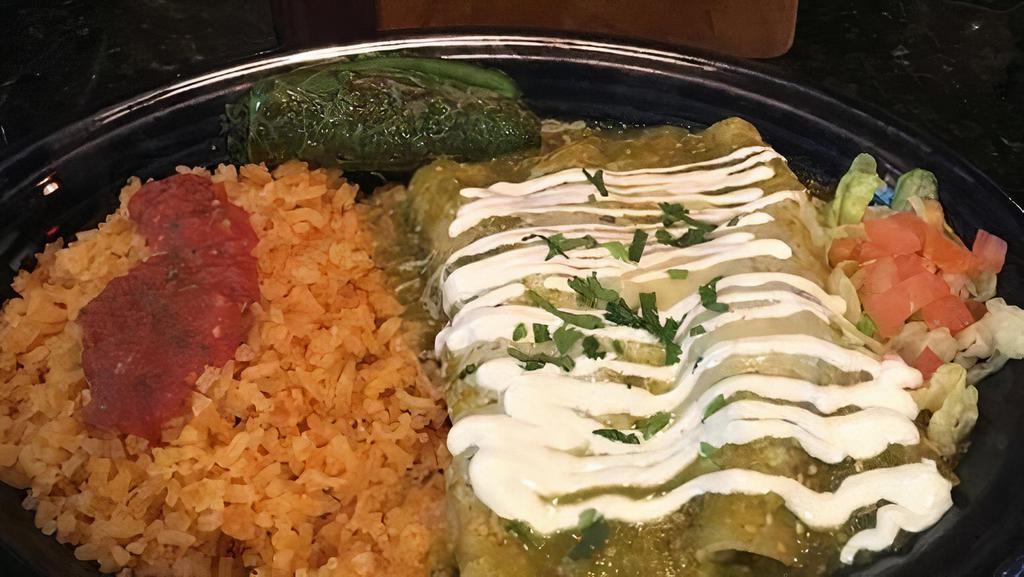 D -Enchiladas Verdes · three soft corn tortillas rolled and filled with ground beef, chicken, or cheese topped with shredded monterey cheese, homemade green tomatillo pepper sauce and sour cream.