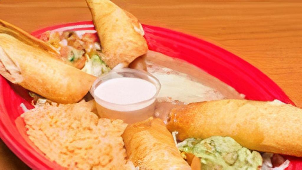 D -Flautas Nortenas · Teocali's very own creation. Two rolled, deep fried chicken flour tortillas with homemade chipotle sauce and monterey cheese, served with a side of guacamole, and pico de gallo.