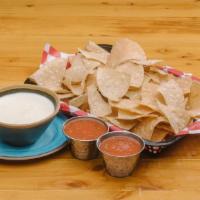 Queso Blanco · Gluten-free. White queso with a hint of garlic. No visible veggies for the kids!