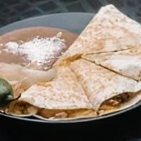 Quesadillas · Large 12'' tortilla stuffed with Monterrey and cheddar cheese with choice of meat. Served wi...