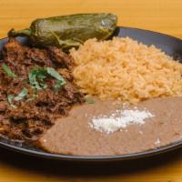 Carne Guisada · Gluten-free. Homemade stewed beef! Slow roasted with tomato, tomatillo and a blend of Mexica...