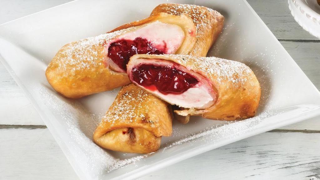 Strawberry & Cream Cheese Chimichanga · Delicious strawberries and sweet cream cheese, tucked inside two hand-rolled wraps, lightly fried and dusted with powdered sugar.  Served with chocolate dipping sauce.