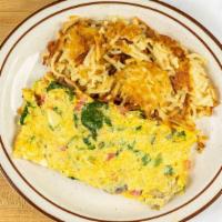 Veggie Omelet · made with 4 eggs Tomatoes, onions, green peppers, spinach, mushrooms, broccoli and American ...