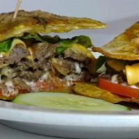 Jibarito Sandwich · Steak, ropa vieja, lechón, or chicken with grilled onion, American cheese, mayonnaise, lettu...