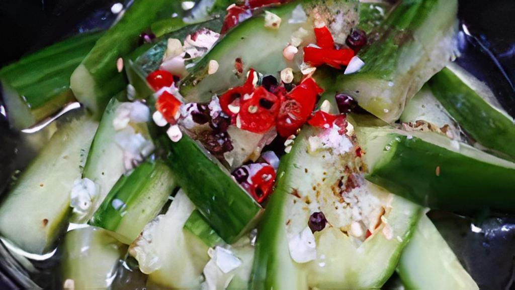 Spicy Cucumbers · Cucumbers tossed in a spicy garlic sesame sauce.