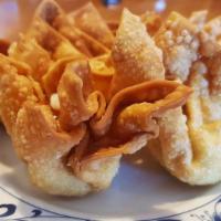 Crab Rangoon (5 Pieces.) · Cream cheese perfectly mixed with crab meat and celery fried to a golden crisp. Served with ...