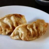 Fried Dumplings (5 Pieces.)  · Minced pork, cabbage, green onions, ginger, and sesame oil. Served with house dipping sauce.