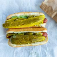 Beef Hot Dog · On a poppy seed bun with mustard, onion, relish, sport peppers, pickle spear, and homemade p...