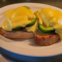Egg  Benedict · Two poached Egg , Canadian bacon and green pepper on homemade toast and topped with hollanda...