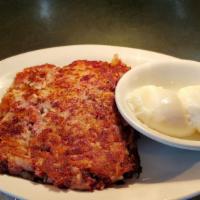 Corned Beef Hash · Made in-house with two egg preparation any style and toast