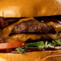 Cowboy · Hickory Smoked Bacon, Aged Cheddar Cheese, BBQ Sauce, Shredded Lettuce & Tomato. Make it a d...