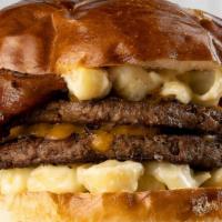 Mac & Chz Burger · White Cheddar Macaroni & Cheese, Bacon on a Pretzel Bun. Make it a double today!