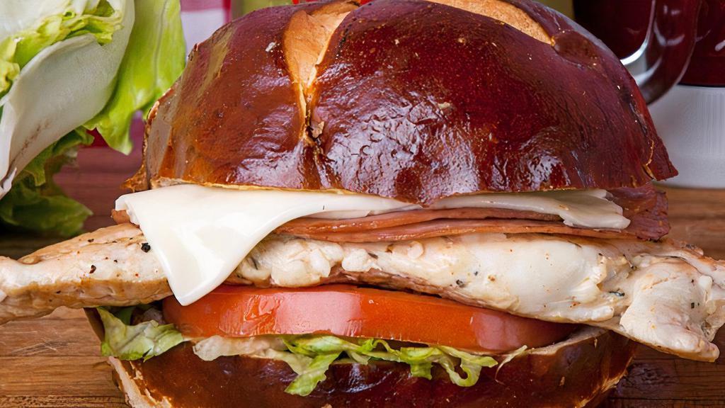 Malibu On Pretzel · Grilled Smoked Ham, Swiss Cheese, Lettuce, Tomato with side of Honey Dijon on a Pretzel Bun tastes great with grilled chicken!