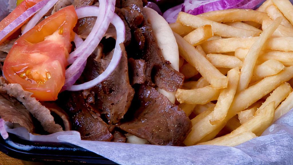 Gyro Dinner With Fries · Gyro Meat, tomatoes & onions
Tzatziki on side

*DINNER INCLUDES fries, feta, olives & pepperoncini's