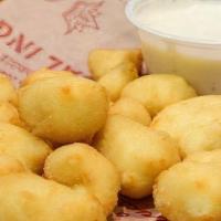 Cheese Curds - Regular · Lightly breaded and made with 100% Wisconsin White Cheddar Cheese
