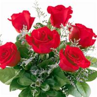 Half Dozen Red Roses Vase #P050R · Share the love with six beautiful red roses designed with fresh foliage and delicate accents...
