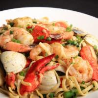 Linguini Pescatore · Shrimp, scallops, clams, lobster, peppers and spinach sautéed in olive oil garlic sauce with...