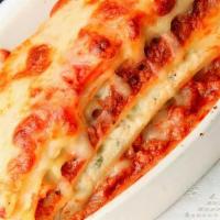 Lasagna · Baked layers of Italian cheeses with bolognese sauce.