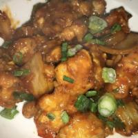 Gobi Manchurian · Deep fried cauliflower tossed with tangy sauce, and Indian spices.