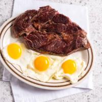 9 Oz Ny Strip Steak & Eggs · Served with two eggs, hash browns or grits, toast and jelly.