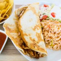 Quesadilla Chipotle · Quesadilla stuffed with grilled chicken, grilled onions, and chipotle sauce. Served with ric...