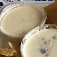 Queso Dip · Melted cheese dip.