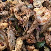 Fajitas Mi Pueblo · Steak, chicken, shrimp, chorizo, and carnitas.