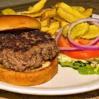 Naked Burger · Certified Angus beef (cooked medium) served with lettuce, tomato, pickle and onion.