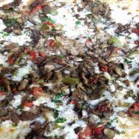 Philly Cheesesteak Pizza · Philly cheesesteak, onions, peppers, mushrooms & mozzarella cheese.