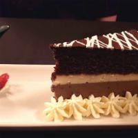 Chocolate Decadence Cake · Three layer chocolate decadence cake.