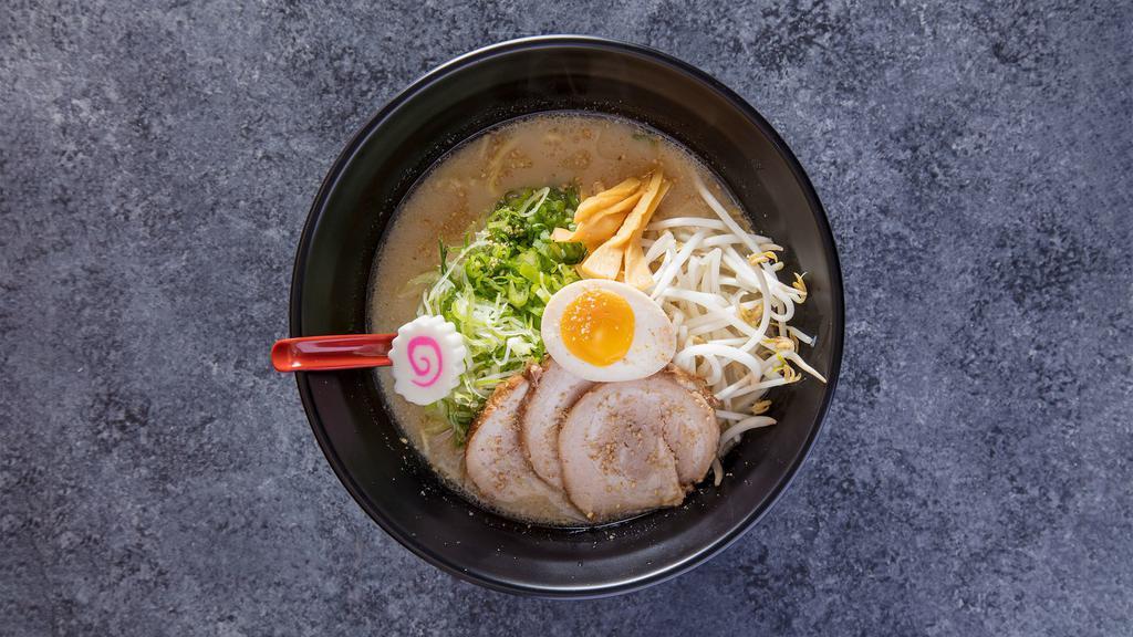 Tonkotsu Ramen · Japanese-style noodle soup with Char Siu, scallion, bean sprout, egg boiled, sesame seed, welsh onion, narutomaki, and menma bamboo shoot.