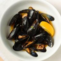 Cozze · Sautéed mussels with your choice of marinara sauce or garlic oil lemon sauce.