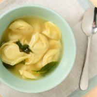 Tortellini Soup · Bowl. Tortellini in chicken broth, spinach, and Parmigiano cheese.