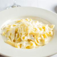 Fettuccine Alfredo · A homemade cream sauce with Parmesan cheese.