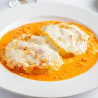 Rotolo Di Pasta · Tricolor pasta rolled with ricotta cheese, spinach, in a tomato cream sauce and baked with M...