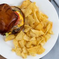 Double Stack · 2 -1/4 lbs. beef burgers, house-made American cheese, griddled onions, quick pickles, toaste...