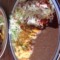 Mexican Dinner · Two beef, chicken, or cheese enchiladas and one pork tamale. Served with rice, beans, and a ...