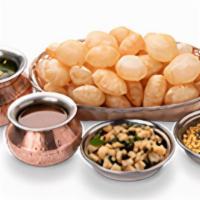 Pani Puri Family Basket.. · 40 bite-size hollow wheat balls, filled with potato, chickpeas, spicy mint water and sweet s...