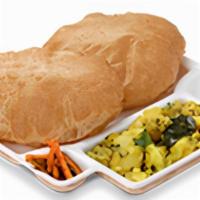 Puri Bhaji... · Wheat puris served with spiced potato curry.