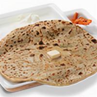 Aloo Paratha. · Unleavened dough stuffed with a spiced mixture of mashed potato, rolled out and cooked on a ...